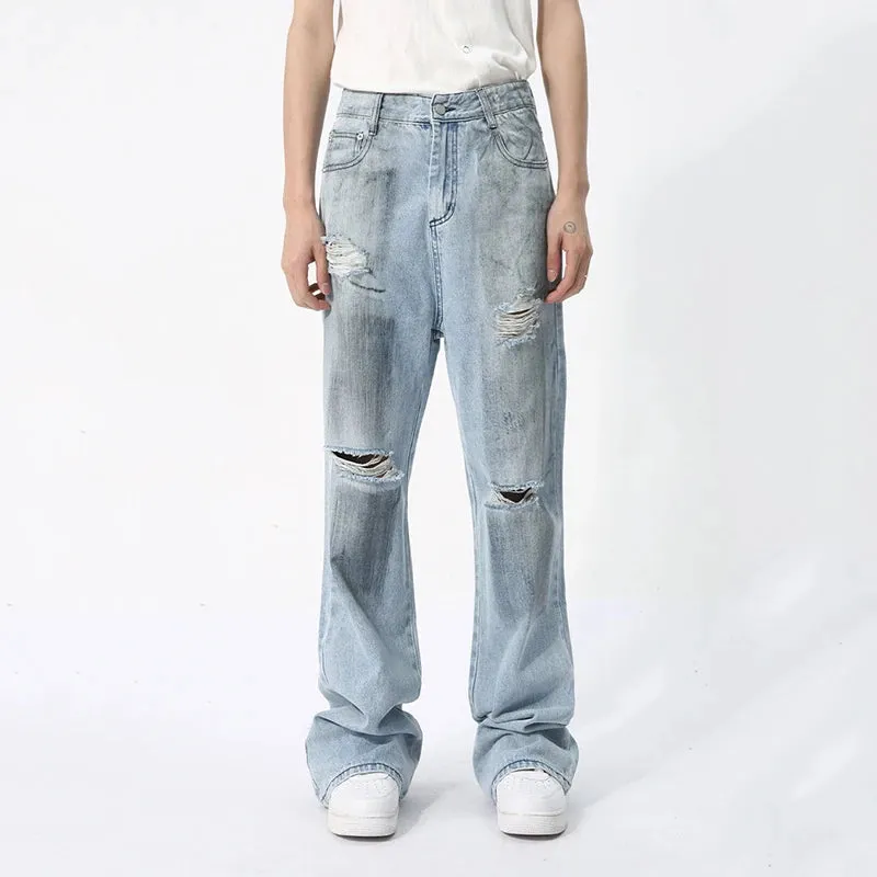 Ripped Loose Fit Washed Denim Jeans